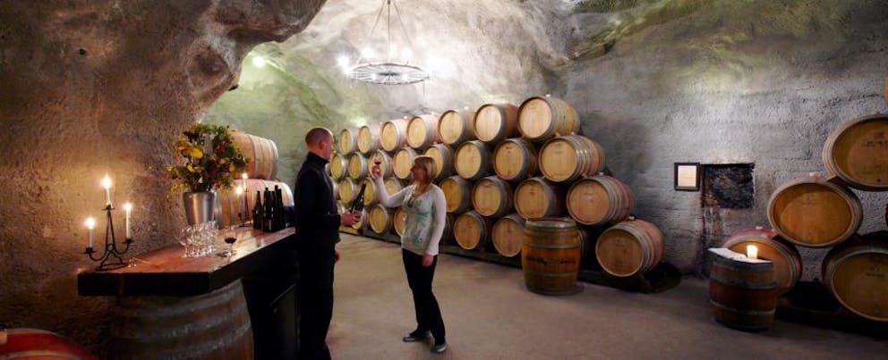 croppedimage960390 Wine tasting in wine cave Lo res